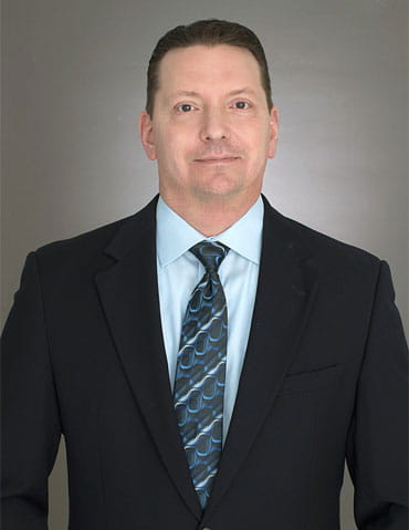 Alan Tchabushnig headshot.